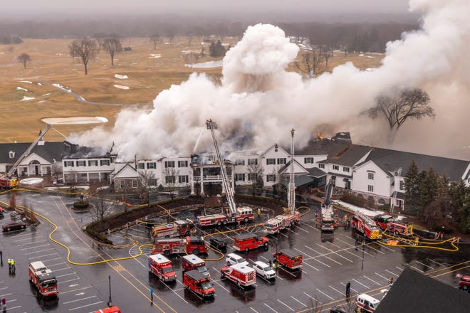 Smoke rises from the Oakland Hills Country Club in Bloomfield Hills on Thursday, February 17, 2022.