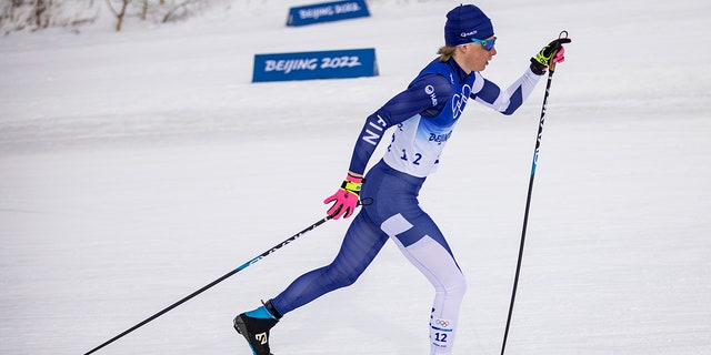 Remi Lindholm of Finland competes during the men's 15km classic cross-country skiing during the Beijing 2022 Winter Olympics at the National Cross-Country Ski Center on February 11, 2022 in Zhangjiakou, China.  (Photo by Tom Wheeler/VOIGT/DeFodi Images via Getty Images)