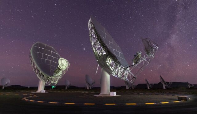 Fifteen of the 64 dishes of the MeerKAT radio telescope under a starry sky in the Karoo, South Africa. 