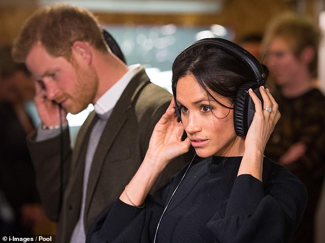 Prince Harry and Meghan Markle visit a radio station in Brixton, south London, in January 2018