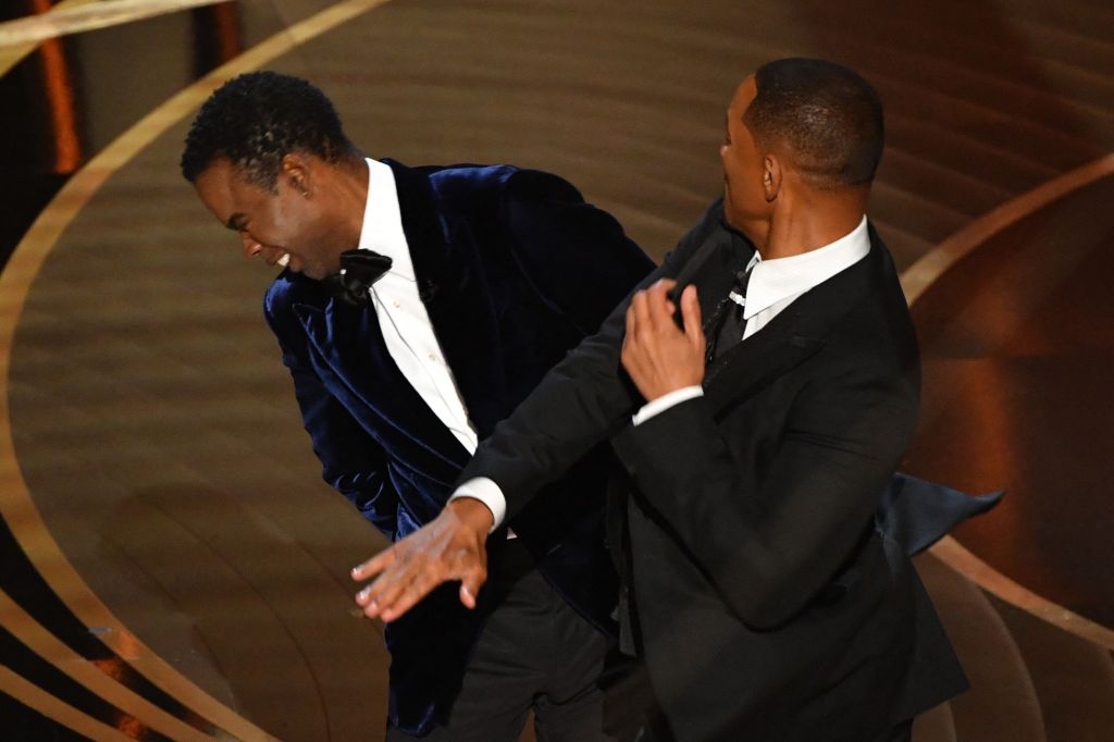 Will Smith slaps Chris Rock during the 94th Academy Awards at the Dolby Theater in Hollywood, California on March 27, 2022. 