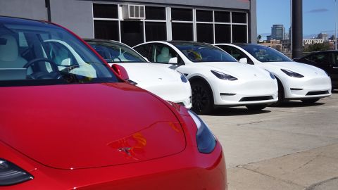 Tesla cars sit in a yard sale on March 28, 2022 in Chicago, Illinois. 