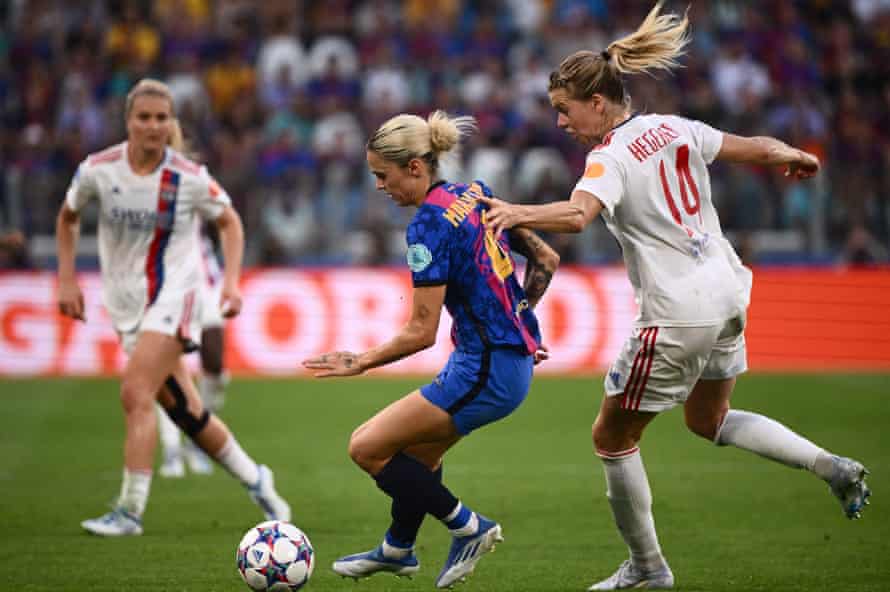 Barcelona's Maria Pilar Leon is being harassed by Ada Hegerberg.