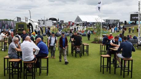 Competitors enjoy the fan zone before the start of the inaugural LIV Golf event.