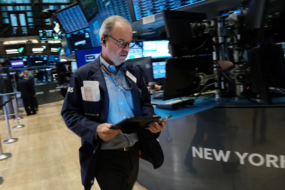 NEW YORK, NY - JUNE 27: Traders work on the floor of the New York Stock Exchange (NYSE) on June 27, 2022 in New York City.  The Dow Jones Industrial Average opened lower in morning trading to break out of last week's market rally.  (Photo by Spencer Platt/Getty Images)