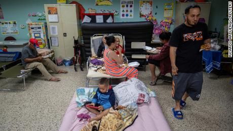 Evacuees have taken refuge in the classroom of a public school-turned-shelter in Guayanila, Puerto Rico.