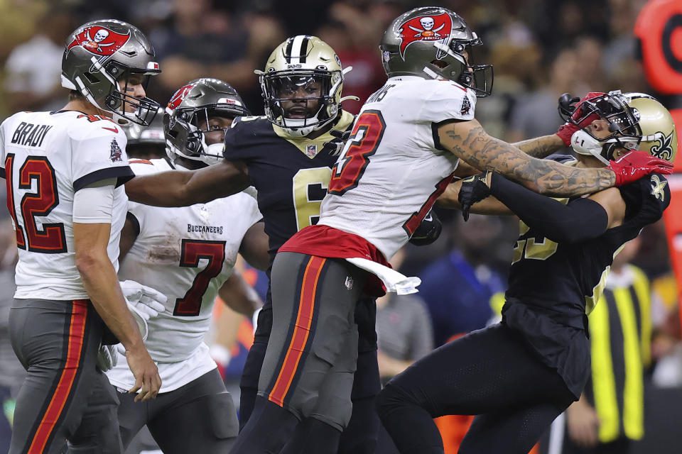Tampa Bay Buccaneers wide Mike Evans (13) and New Orleans Saints Cornerback Marshon Lattimore (23) got into an argument during the second half of an NFL football game, Sunday, September 18, 2021, in New Orleans.  (Associated Press / Jonathan Backman)