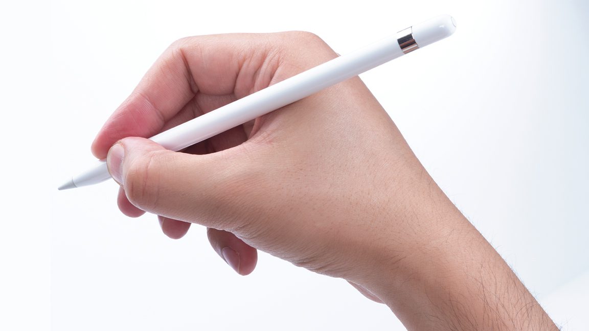 Photo of a person using an Apple Pencil